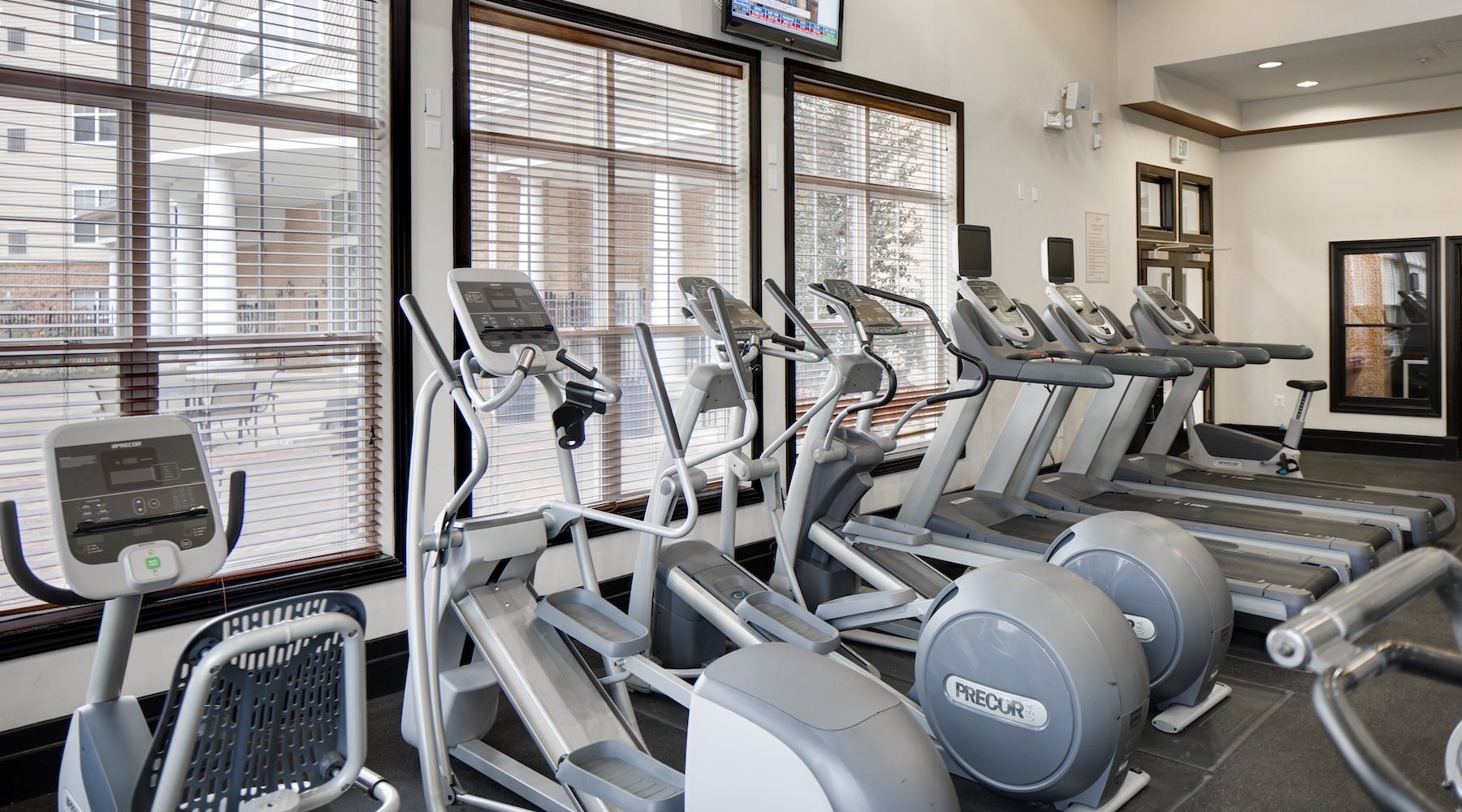 fitness center with exercise equipment